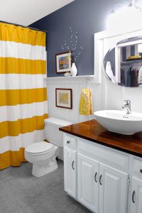 how-to-make-a-small-bathroom-look-good-on-a-budget-with-shower-curtain-paint-colour-and-more.jpg